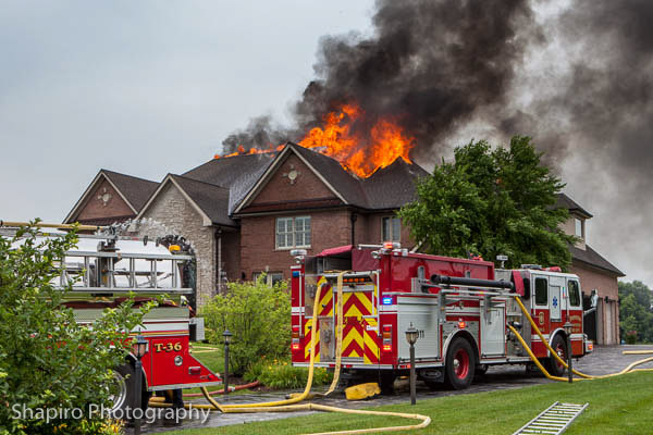 massive house gutted by fire after lightning strike in South Barrington IL 7-9-13 Larry Shapiro photography
